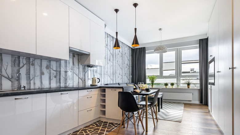 Kitchen with gray/white wallpaper