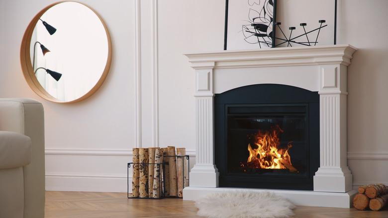 Faux fireplace in white room