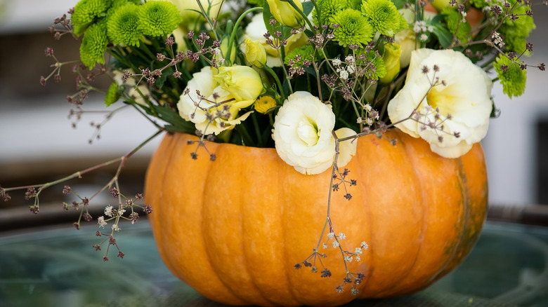 Autumn flowers in pumpkin