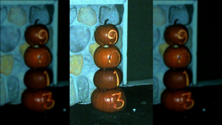 Pumpkins displaying house number