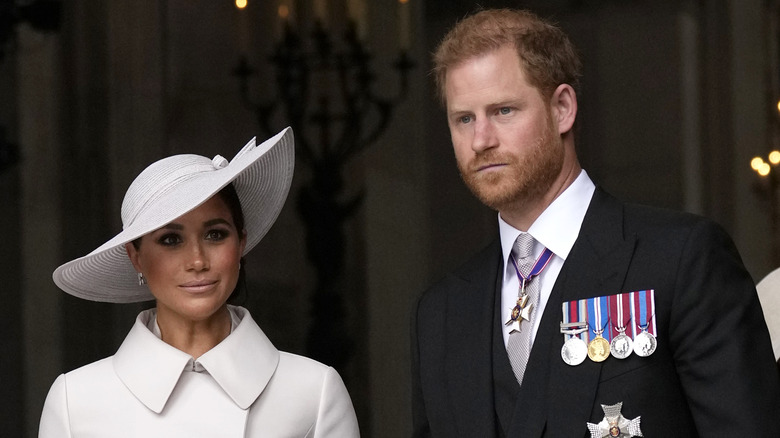 Prince Harry and Meghan Markle posing 