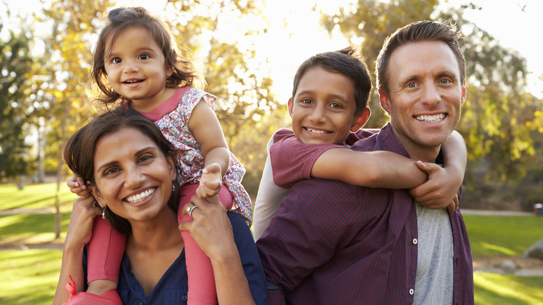 Mixed race couple and kids