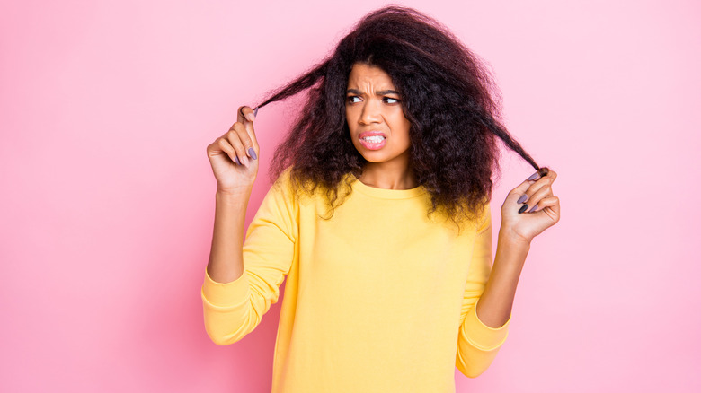 Frustrated woman pulling hair