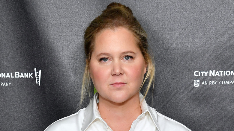 Amy Schumer wearing white