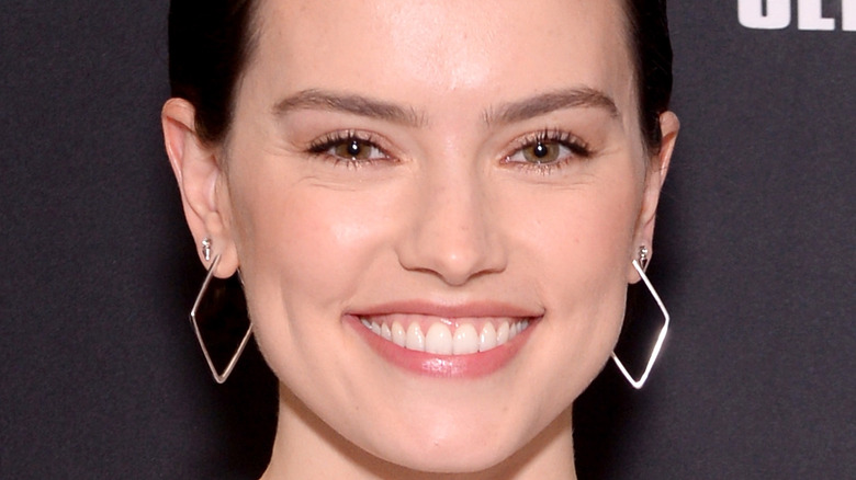 Daisy Ridley smiles