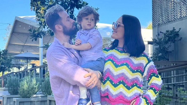 Nikki Garcia and Artem Chigvintsev with their son