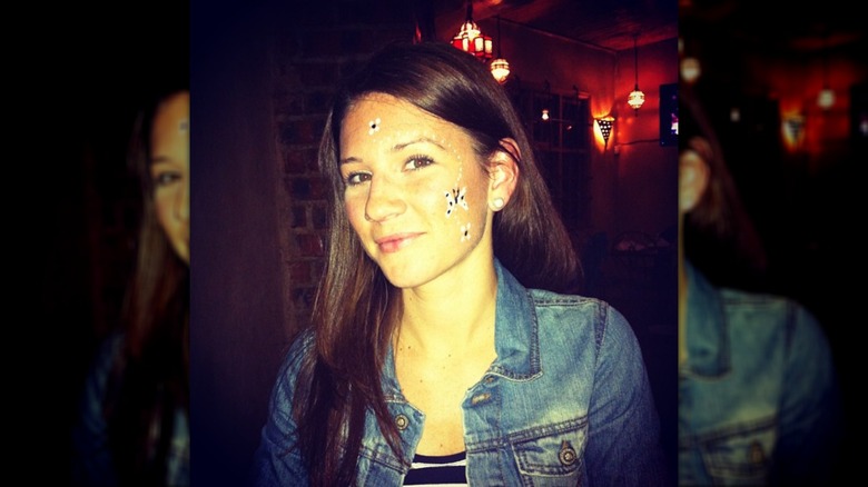 Danielle Busby wearing facepaint