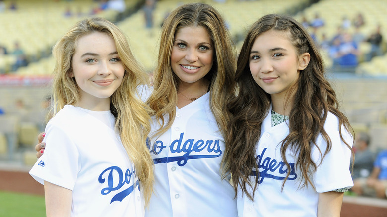 Danielle Fisher smiling with Girl Meets World costars