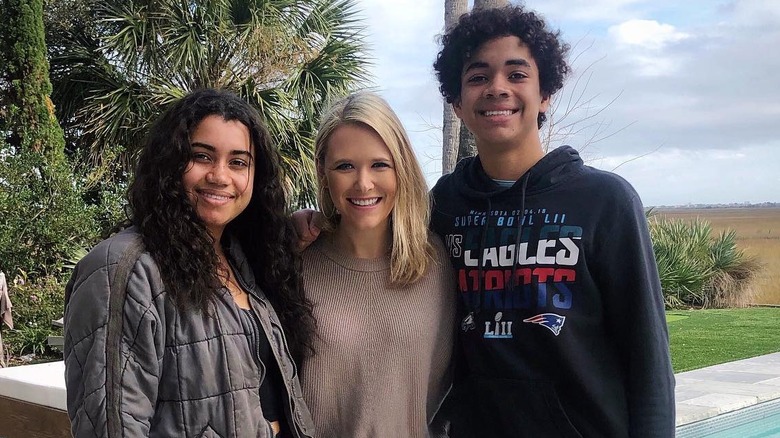 Daniella Rucker, Jack Rucker, and  Eliza Tew smiling