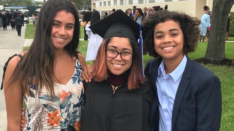 Daniella, Carolyn, and Jack Rucker smiling