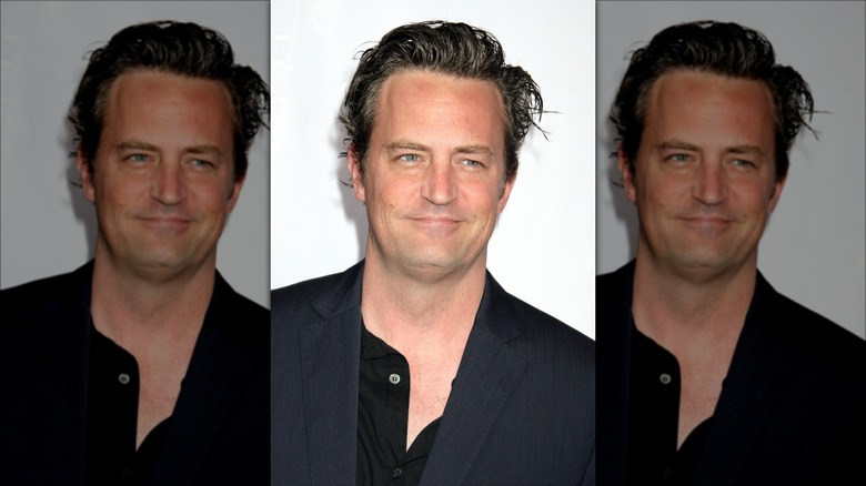 Matthew Perry smiling at a red carpet event