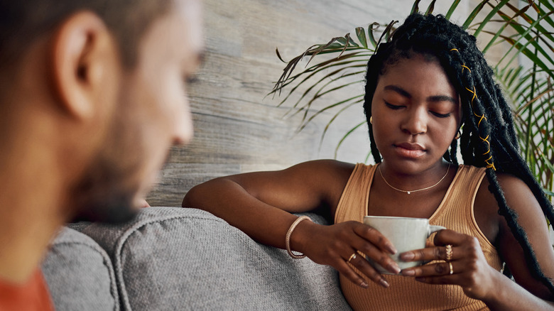 Unhappy couple on a couch