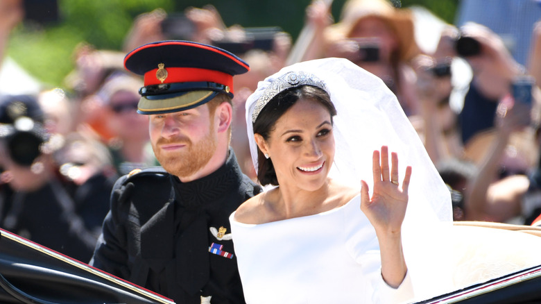 Prince Harry and Meghan Markle in carriage