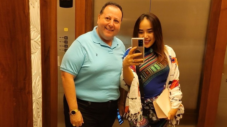 David and Annie Toborowski smiling in an elevator