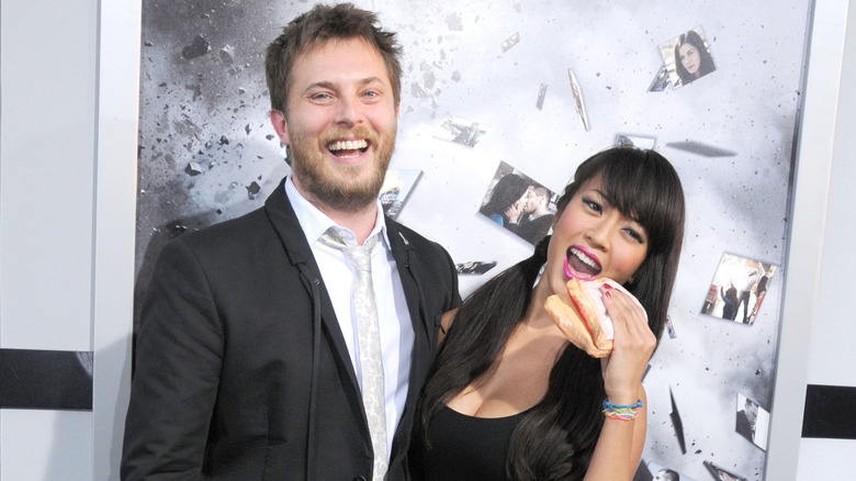 Duncan Jones and Rodene Ronquillo smiling at the premier of "Source Code"