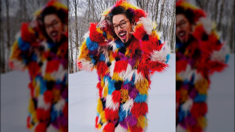 David Bromstad wearing a multi-colored coat 