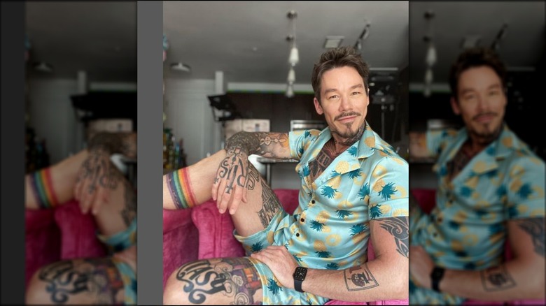 David Bromstad sitting on couch 