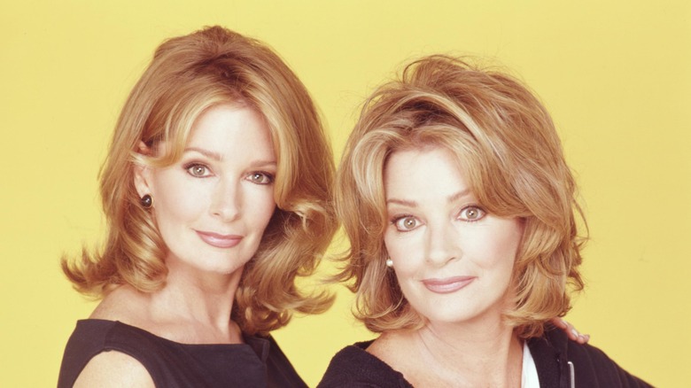 Deidre Hall and her twin sister Andrea Hall posing