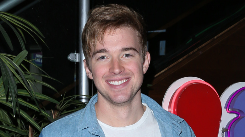 Chandler Massey smiles for a photo