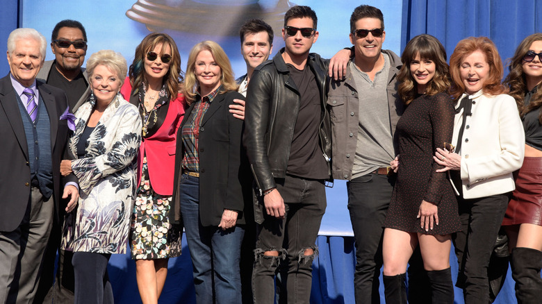 Days of Our Lives cast members smiling at an event. 