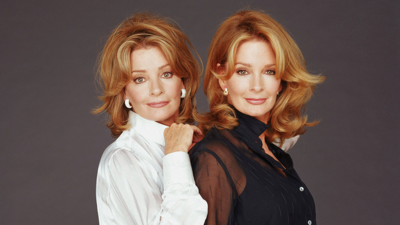 Deidre Hall and twin sister Andrea Hall posing