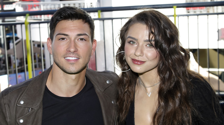 Robert Scott Wilson and Victoria Konefal smile for a photograph