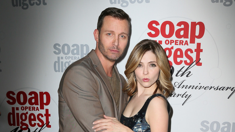 Eric Martsolf and Jen Lilley embrace