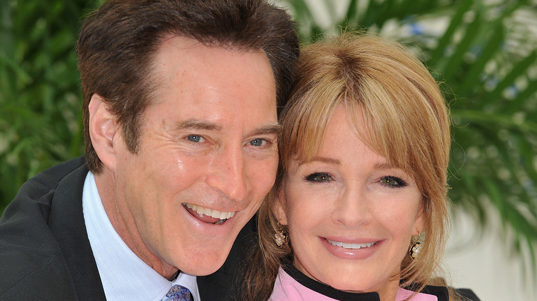 Drake Hogestyn and Deidre Hall smile for a photo  