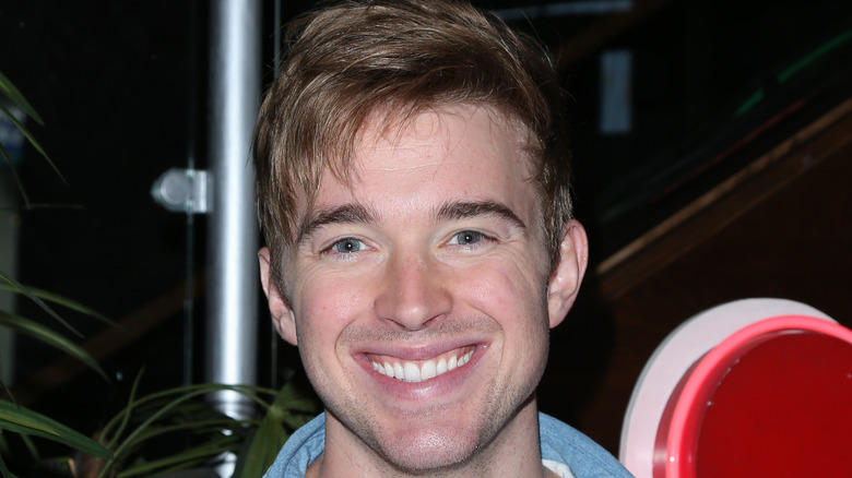 Chandler Massey smiles for the camera. 