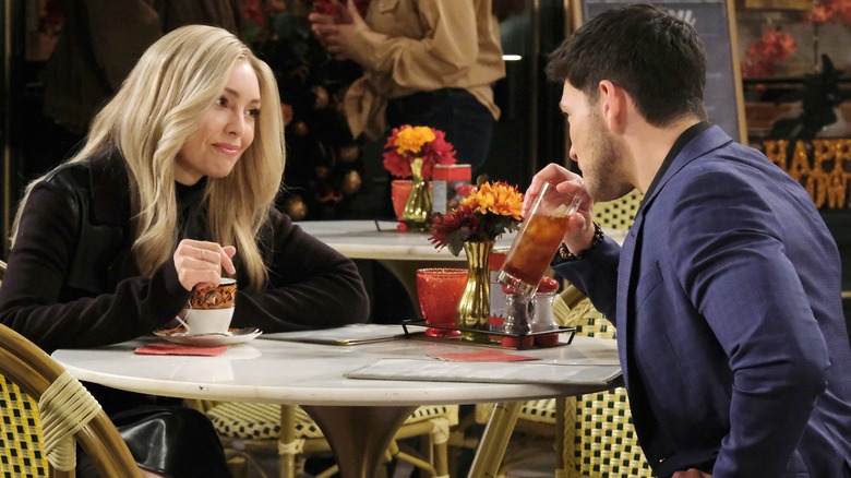 Emily O'Brien and Robert Scott Wilson at a table