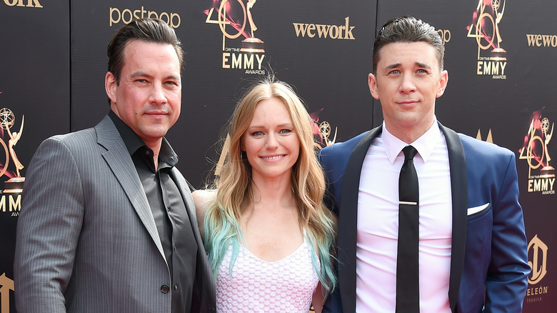 Tyler Christopher, Marci Miller, and Billy Flynn at an event. 