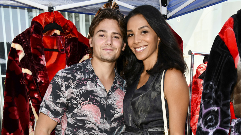 Carson Boatman and Julana Dizon smiling on the red carpet