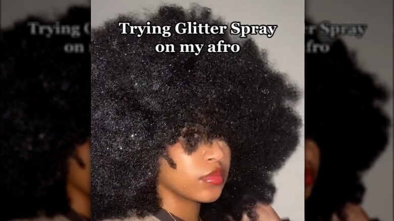 Woman with a glittery afro