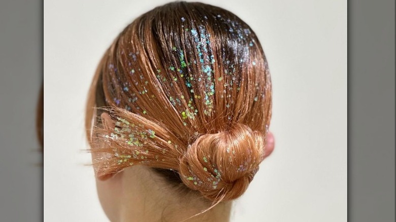 Slicked back bun with hair glitter