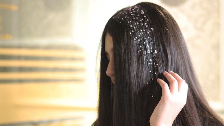 Person with hair glitter