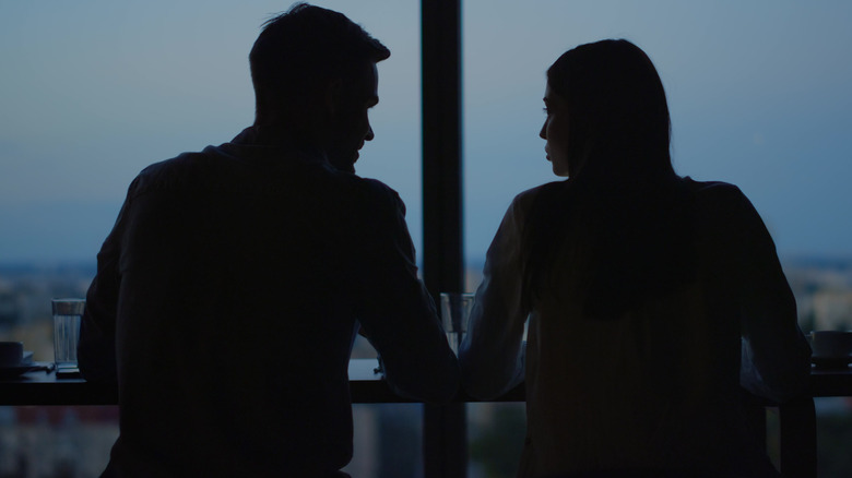 Two coworkers take in the view together