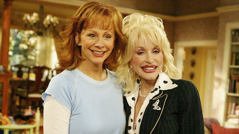 Dolly Parton and Reba McEntire smiling