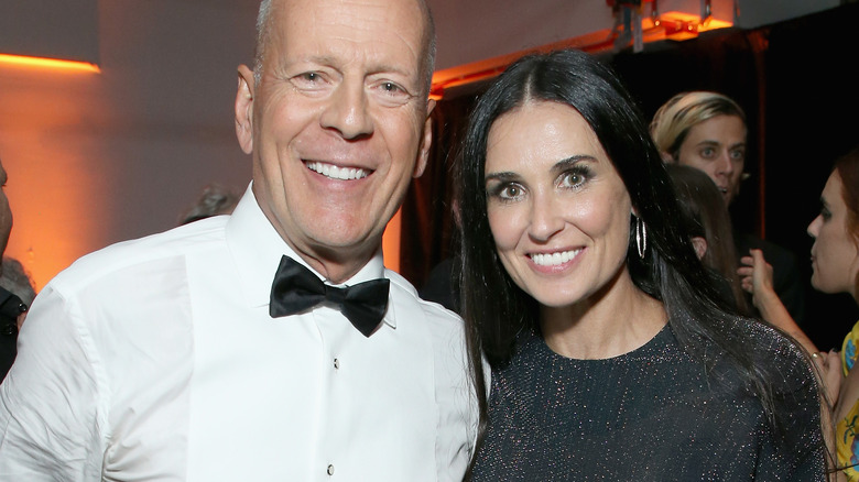 Demi Moore and Bruce Willis at an event. 