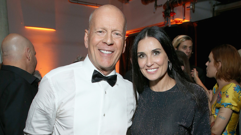 Bruce Willis and Demi Moore smiling