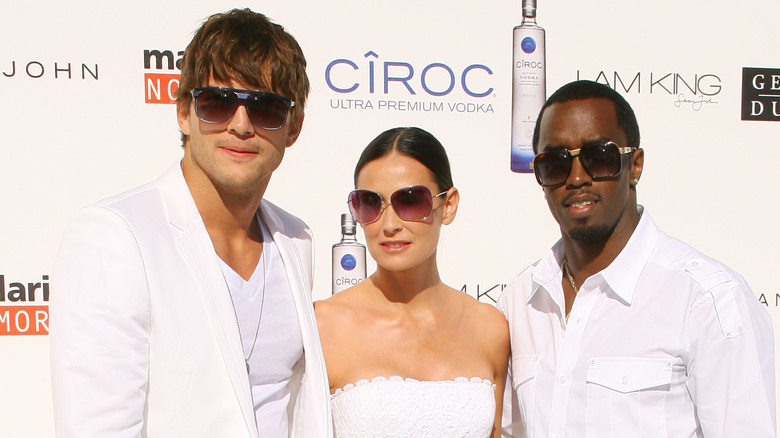 Ashton Kutcher, Demi Moore, and Sean "Diddy" Combs in 2009