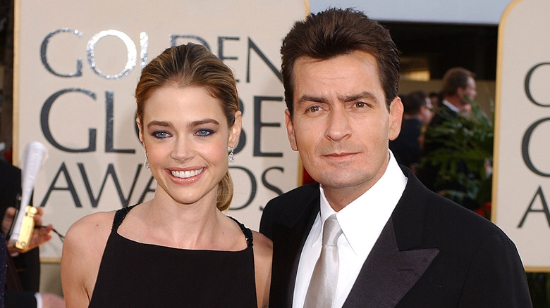 Charlie Sheen and Denise Richards at a red carpet