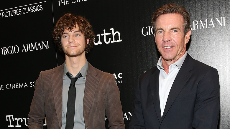 Jack Quaid and Dennis Quaid smiling