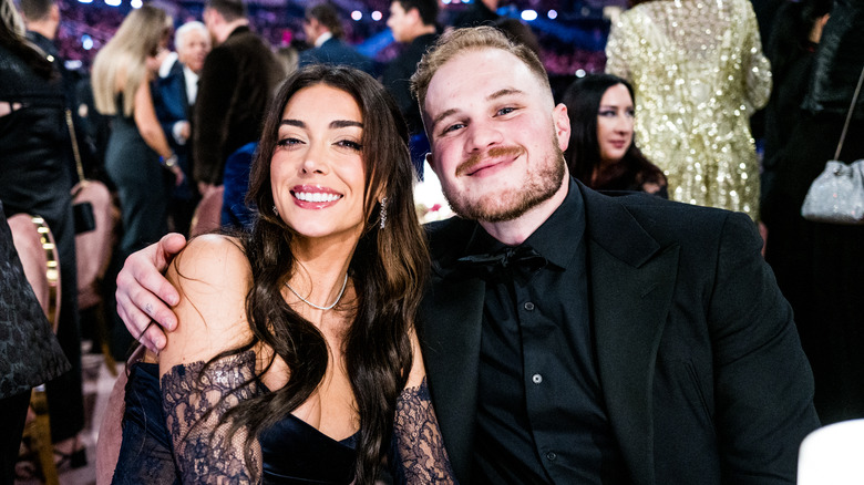 Zach Bryan and Brianna LaPaglia smiling at an awards show