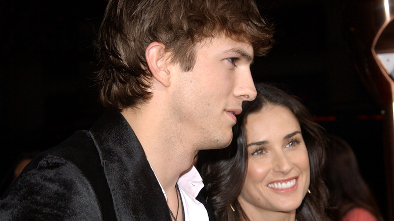 Ashton Kutcher and Demi Moore standing together