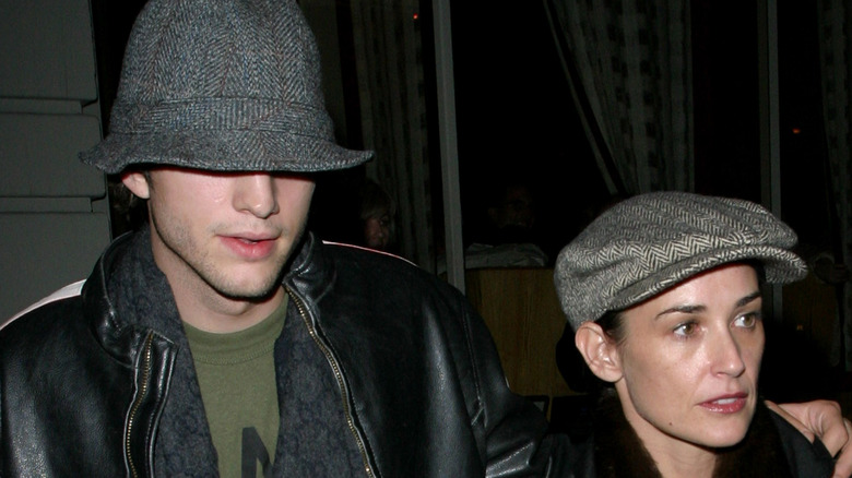 Ashton Kutcher and Demi Moore in hats