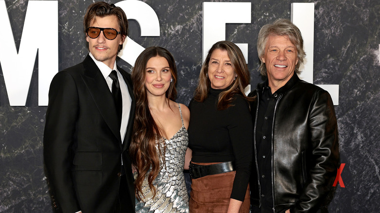 Jake Bongiovi, Mille Bobby Brown, Dorothea Hurley, and Bon Jovi smiling