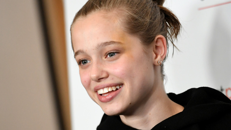 Shiloh Jolie-Pitt smiling 