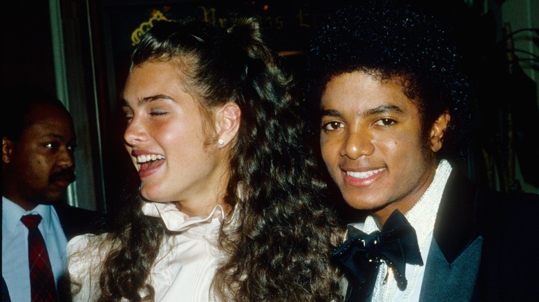 Brooke Shields and Michael Jackson posing