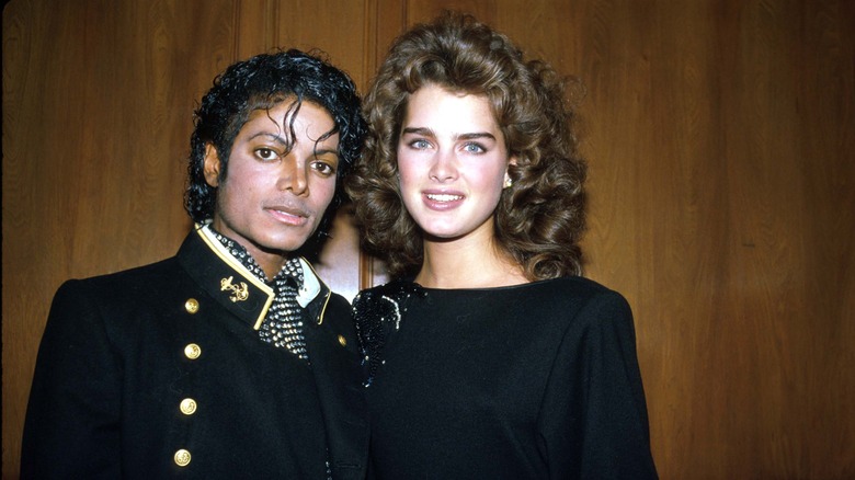 Brooke Shields and Michael Jackson posing