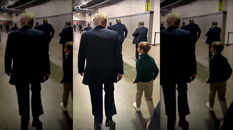 President Donald Trump walks with grandson Theodore Kushner at Super Bowl 2025